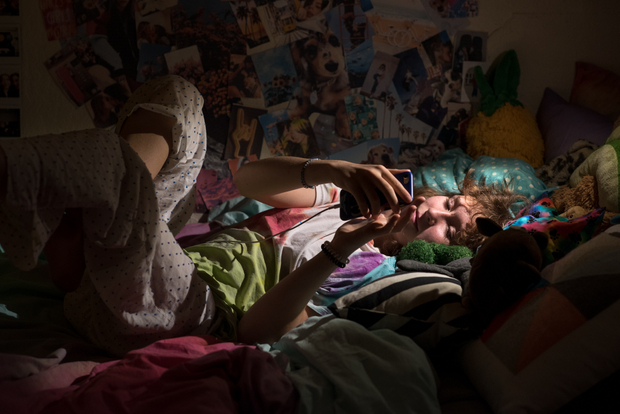 Bedroom on her phone