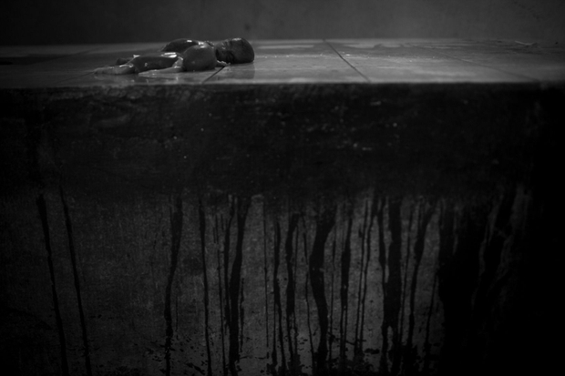 © Christian Werner - Iraq, Basrah, 22 April 2012 – In a small room at the children’s cemetery in Basrah, the bodies of dead child first receive a ritual washing before they are buried. Stillborn twins lying on a stone table.