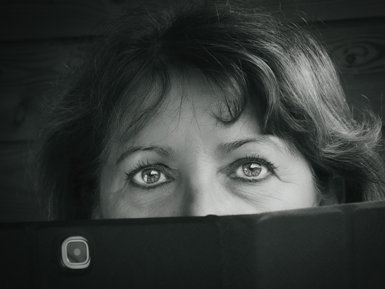Behind the tablet