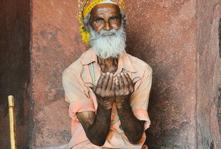 Man praying outside the mosque