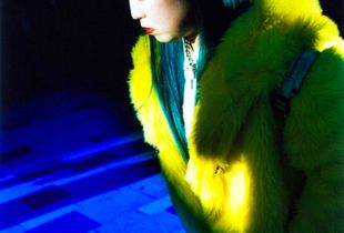 Girl in the street with blue memory