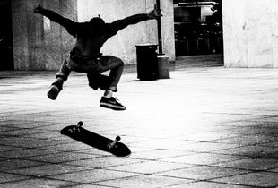 skateboarder at night