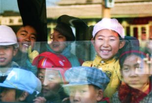 Kids on a bus in Beijing