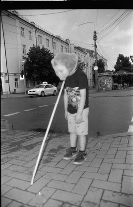 Portrait of a son by a blind mother