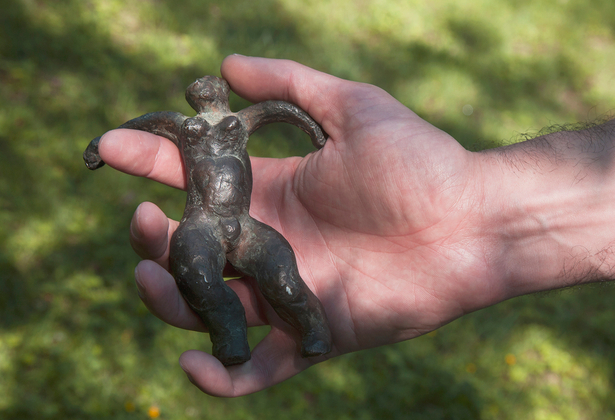 Stowaway - Michael holds the figurine