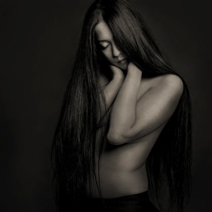 She keeps her hair long because she loves the way it feels, part cloak, part mane, part security blanket.
