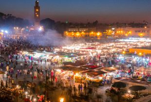 Twilight in Djemaa el-Fna square, (the main square) in the old medina in Marrakesch, Morocco