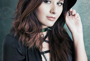 Girl with clothes and black hat