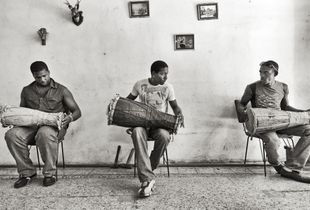 Practicing La Clave, the Traditional African Beat on the Bata Drum