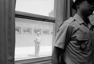 Two Soldiers Standing Inside and Outside in the JSA(The Joint Security Area), Gelatin Silver Print, 2016