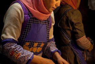 Food vendor in Muslim Qtr., Xian, China. (Orange Girl)