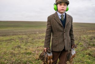 Boy with Dead Birds