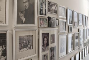 One of several walls of photos in Nanny's home.