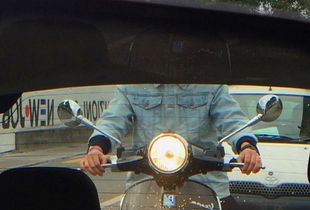 Vespa in mirror