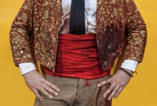 Forcado's jacket stained with blood after the face catch. The jacket distinguishes each group from a another because of the different fabrics and patterns. It is also extremely important for the forcados since it passes from generation to generation. © Eduardo Leal