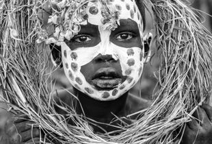 ZANE - Young Suri Boy with leaves and branches