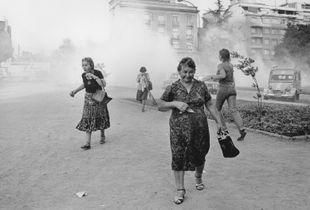 Women suffer from tear gas during a demonstration against Pinochet on International Women's Day. Santiago; Chile, 1985