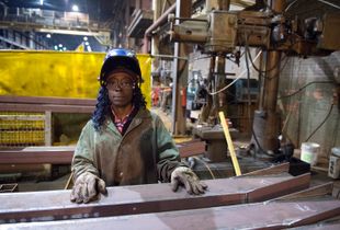 Leonna poses for a photo during her work day.