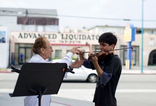 Darren and student at garage sale