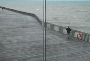 Man walking on Pier