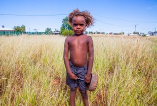 Boy in the long grass