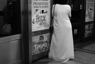 A lady waiting for the green line train