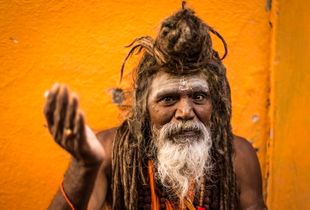 Shaivas Sadhu or Shiva worshiping Indian holy man giving ‘darshan’ or a blessing, Kumbh Mela, India,  2015.