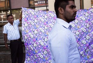 Fabric salesman in Kandy, Sri Lanka