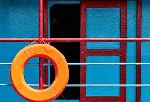 Fishing boat with ring buoy in the Fishing Port Kejawanan, Cirebon, West Java 2017