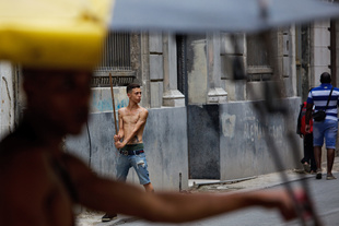 Playing baseball with a stick -Havana