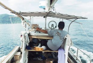 Mr. Okamoto, one of Iwaishima's fishermen, comes home from a day out on the Seto Sea.