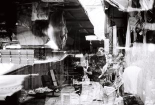 "Double exposure at shuk"