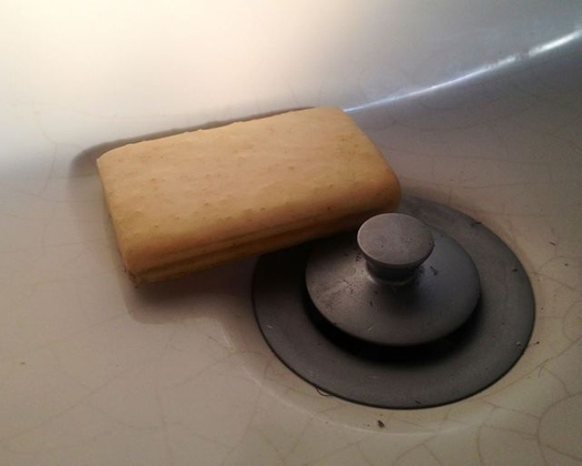 soap in bathroom sink (late afternoon light)
