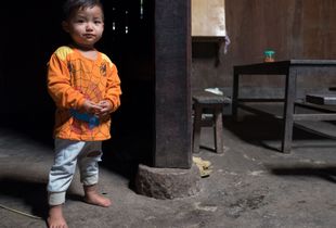 Portrait of a Black Hmong boy.