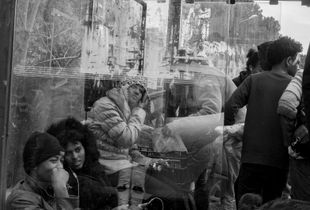 Roya valley (France)_With the registration from Breil Roya police, the refugees wait in the bus station to go to Nice to make their asylum application.