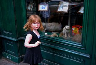 Girl Outside Musée des Rats