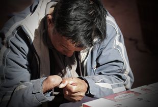 The man selling cigarettes