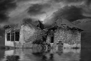 Bombed, flooded house