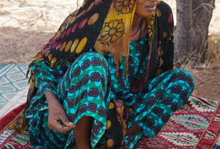 Tuareg Woman On Carpet