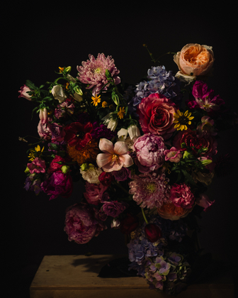 Still life with peonies, roses, tulips and wildflowers