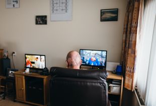 Rob watching two screens