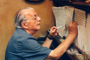 Father composing at his piano