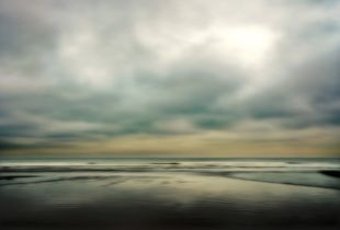 Between the sea and sky, alone I went walking . It was New year's Day.