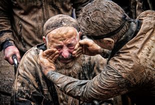 sparge of mud over their bodies on Ashura day.