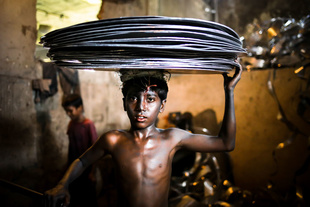 MAHIN is 10-year-old boy who works in an aluminum factory where different kinds of jars and pots are made. He lives in Dhaka with other workers of the same factory.
