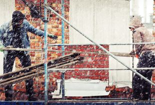 Construction Work in a Snow Storm