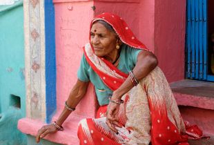 Woman in her doorway, Bundi Rajasthan. India