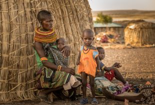 Late afternoon, El Molo tribe family, Lake Turkana, Kenya