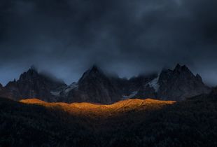 Gold spilled below peaks