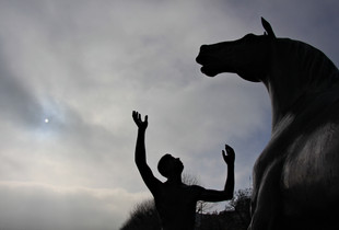Atmospheric Sky and Statue Composition